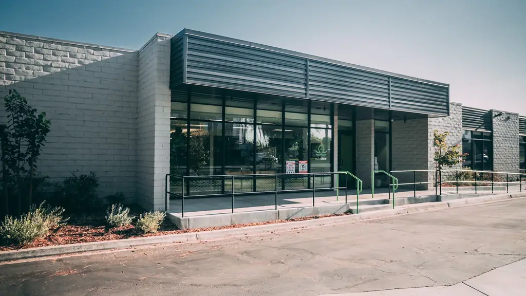 Block and steel frontage of the OctoClean headquarters on Spruce Street, Riverside